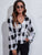 Ruched Printed V-Neck Long Sleeve Blouse